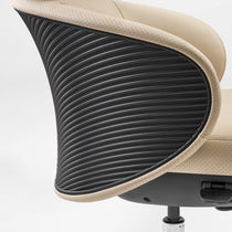 Eureka Ergonomic Royal Rowan executive chair: beige perforated leather trim meets ribbed black backrest detail.