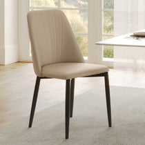 Off-White Chester Dining Chair With Black Legs, Ideal for Dining and Modern Spaces.