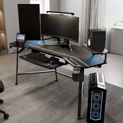 Eureka Ergonomic Wing shaped gaming desk setup with dual monitors, keyboard tray, PC, speakers, and RGB lighting.
