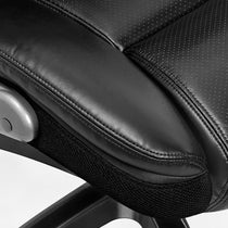 Eureka Ergonomic Close-up of Galene ergonomic office chair seat in cream faux leather, highlighting perforated material, stitching, and mesh panel.