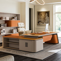 Eureka Ergonomic Zen Altair L-shaped executive desk with orange faux leather and wood accents, paired with matching bookcase and office chair.