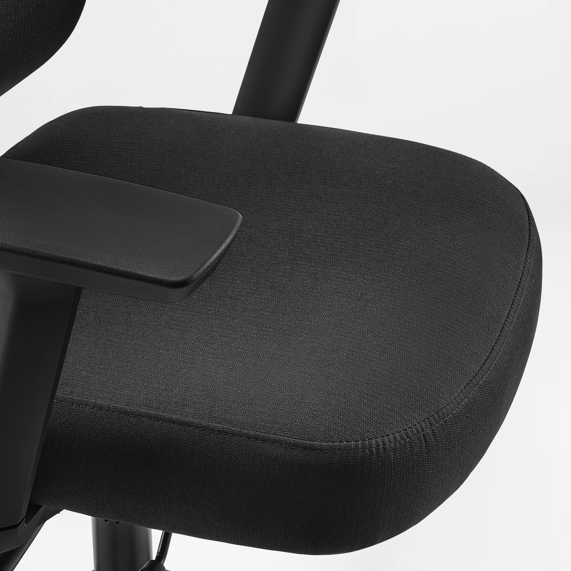 Close-up of a black office chair seat on a white background, green, fabric