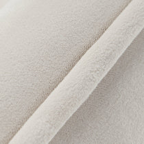 Close-Up of Off-White Velvet Fabric On Shanean Dining Chair, Showcasing Soft Texture and Material Detail.