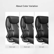 Eureka Ergonomic Galene black faux leather office chair color variations under warm, bright, and dim light.