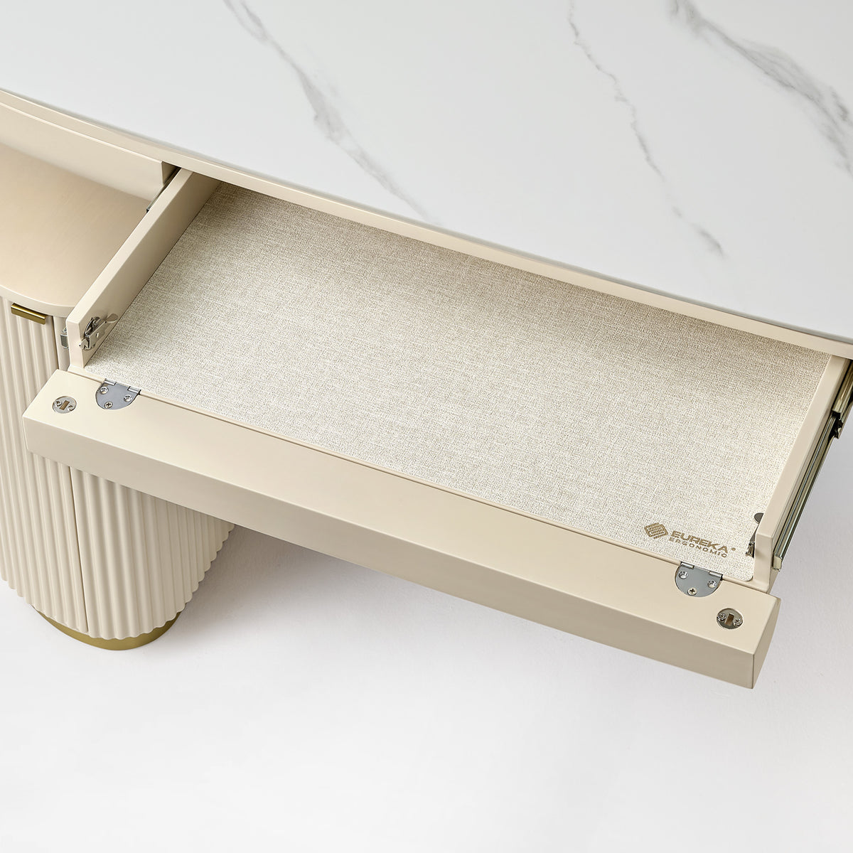 Eureka Ergonomic Opal Oval Executive Standing Desk Drawer Detail, Beige Linen Interior With Logo, Marble Top and Fluted Leg.