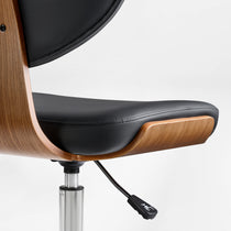 Eureka Ergonomic Close-up of Matt black faux leather office chair seat and backrest with curved walnut veneer shell and chrome lever detail.