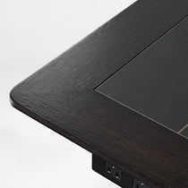 Zen Classic Executive Standing Desk Corner Detail With Dark Wood Finish and Built-In Power Outlet.