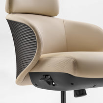 Eureka Ergonomic Royal Rowan executive chair close-up: perforated beige microfiber seat and headrest with ribbed dark gray back accent.