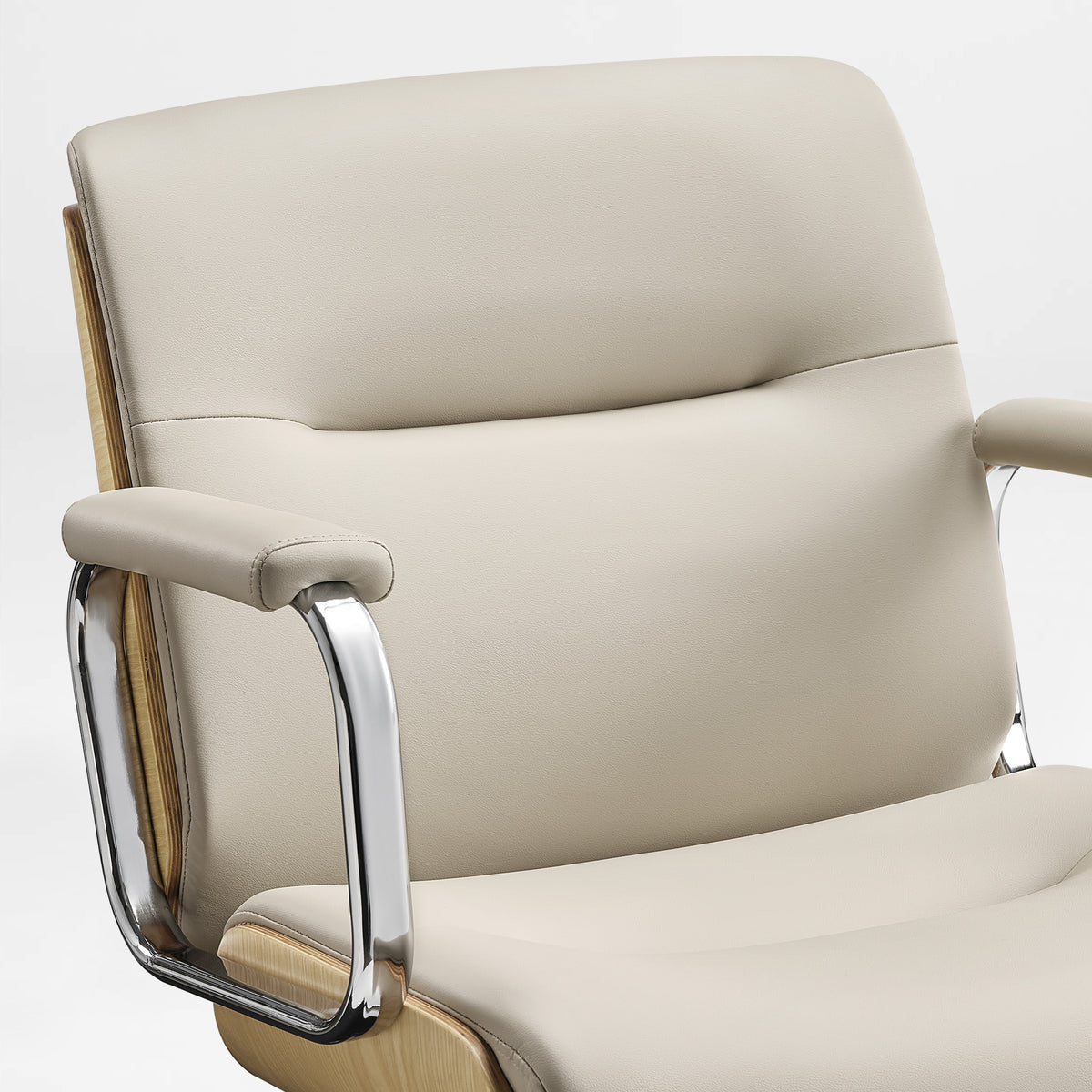 Eureka Ergonomic front close-up of the beige Mathias Mason chair's padded backrest and metal armrests