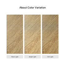 Eureka Ergonomic Ark Lite standing desk light woodgrain finish color variation under warm, bright, and dim lighting.