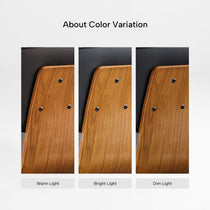 Eureka Ergonomic Matt black faux leather office chair back detail with walnut veneer panel under warm, bright, and dim lighting.