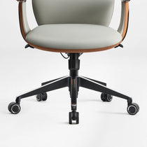 Eureka Ergonomic Cruz Faux Leather Executive Office Chair with polished aluminum five-star base and silent casters