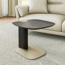 Modern Side Table Next to a Sofa, Featuring a Dark Wood Top and a Golden Metal Base, Modern Luxury Furniture.