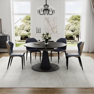 Amelia Round Extending Dining Table With Grey Chairs, Creating an Elegant Dining Setting.