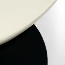 Modern Coffee Table Detail, White Tabletop With Black Base. Contemporary Living Room Furniture for Sale.