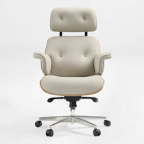 Eureka Ergonomic Mathias light beige Napa leather executive chair with button-tufted headrest and seat, wood veneer accents, silver base.
