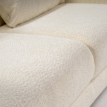 Rowan Loveseat Detail in Cream Sherpa Fabric, Showcasing Texture and Design Elements.