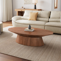 51 Walnut Oval Coffee Table in a Modern Living Room, Walnut Veneer, Stable Base, Perfect for Art and Leisure.