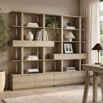 Eureka Ergonomic Ark 78 inch oak bookshelf with drawers and display shelves in a home office