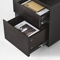 Eureka Ergonomic Zen Classic Executive Standing Desk cabinet detail: dark wood, two drawers, one open with documents, metal slides.