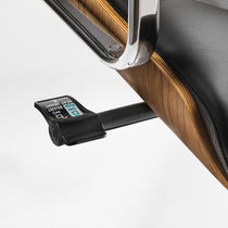 Eureka Ergonomic close-up of the black Mathias Mason chair's walnut shell, seat lever, and controls