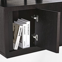 Eureka Ergonomic Zen Classic Executive Standing Desk dark wood cabinet interior with books and visible metal hinges.