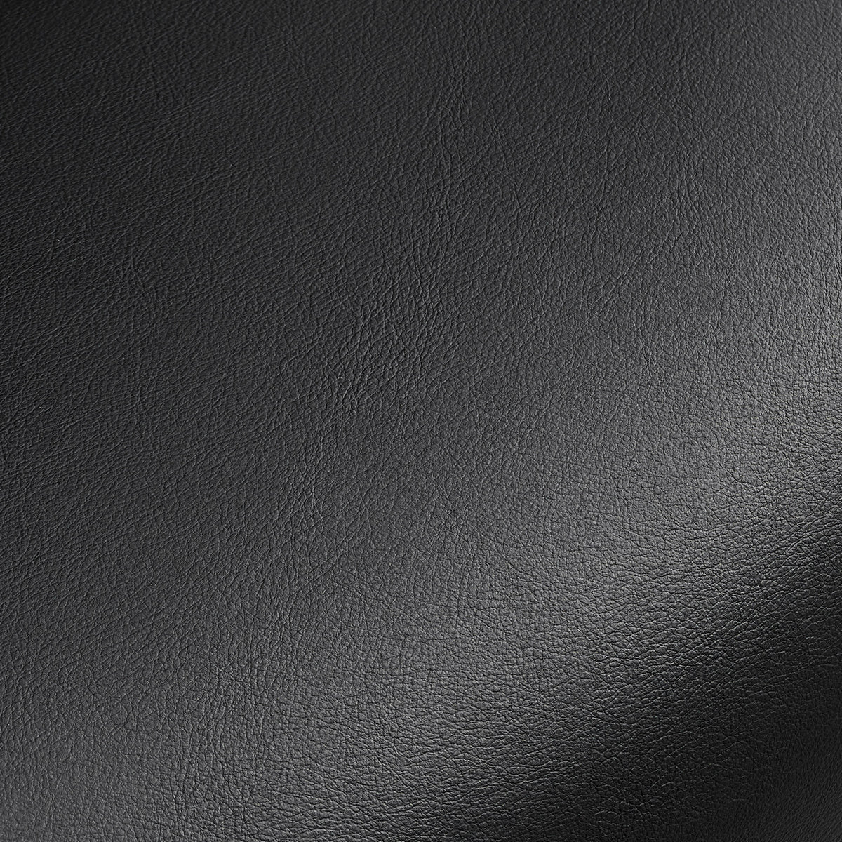 Eureka Ergonomic close-up showing the textured black upholstery on the Mathias Mason office chair