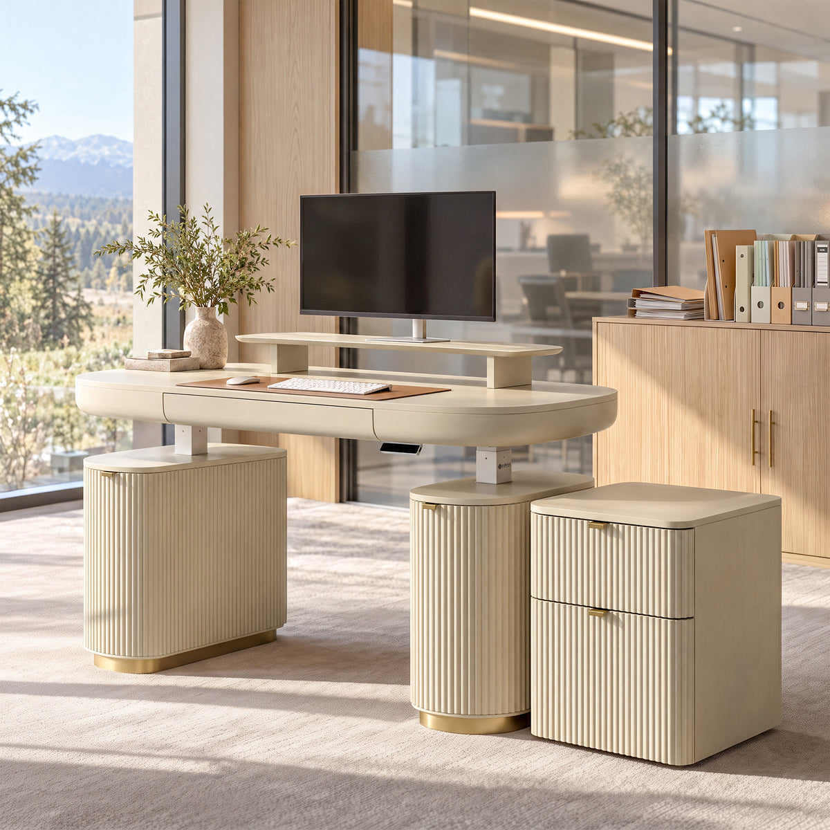 Eureka Ergonomic Opal file cabinet beside the Opal height adjustable standing desk in a bright mountain view office