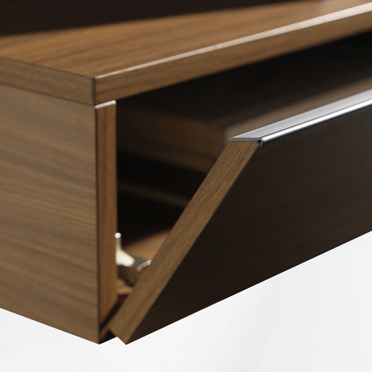 Eureka Ergonomic Ark 78 inch walnut bookshelf with a refined metal accent strip along the drop-down drawer edge