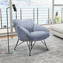 Marco Cozy Lounge Chair in Light Blue Terry Cloth With Black Metal Legs, Perfect for Modern Living.