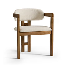 Eureka Ergonomic Elle Boucle Dining Chair in ivory with walnut wood frame, mid-century style.