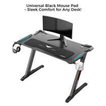 Gaming Desk Setup With Eureka Ergonomic Mouse Pad, Featuring Sleek Design and Comfortable Bat Design.