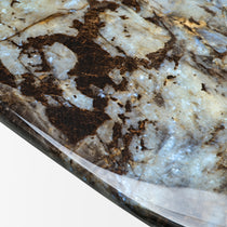 Close-Up of Prada Green Marble Coffee Table Surface, Highlighting the Natural Veining and Texture. Modern Luxury Furniture.