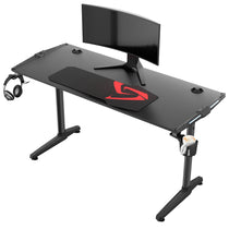 Black Gaming Desk With Mouse Pad and Monitor Setup for Gaming.