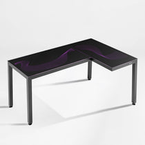 Eureka Ergonomic GTG L-shaped gaming desk with purple wave pattern on black glass surface and metal legs.