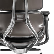 Eureka Ergonomic Gray Forma ergonomic chair rear view: curved aluminum back frame, PU leather seat.