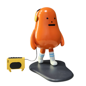 HD-04 Monster Ornament: Orange Character With Headphones and Yellow Speaker, Playful Decor.