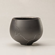 Dark Gray Ceramic Vase With Silver Crack Details, Ideal for Dining Table Or Shelf Decor.