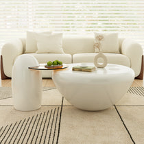 33 Abstract Cat Claw Coffee Table Set With Penguin Side Table in a Modern Living Room Setting. White and Beige Color Scheme.