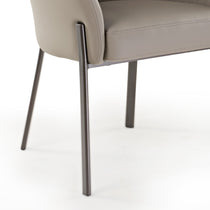 Dark Gray Jade Upholstered Arm Dining Chair Detail. Stitching, Premium Fabric, Dark Metal Legs, Retro-Modern Design.