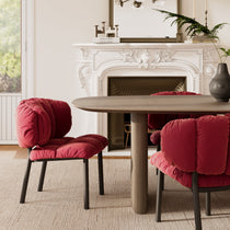 Rlesana Velvet Dining Chair, Red, Petal Back, Black Legs in a Luxury Dining Room Setting.