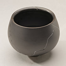 Dark Gray Ceramic Vase With Silver Crack Detail, Perfect for Dining Table Or Shelf Decor.