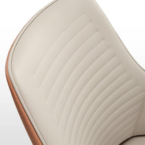 Juliet Dining Arm Chair Detail: Cream Upholstered Seat, Stitched Design, Brown Trim. Modern Dining Chair.