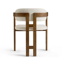 Eureka Ergonomic Elle Boucle Dining Chair, ivory bouclé seat and walnut frame, mid-century style.