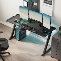 Eureka Ergonomic Black Z-Shaped Gaming Desk With Rgb Lighting and Accessories, Perfect for a Gaming Setup.