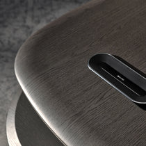 Eureka Ergonomic Zen Orion executive desk surface close-up: dark wood grain with integrated BAIXC tech hub.