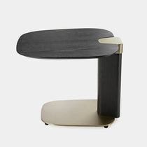 Modern Side Table With Dark Wood Top, Gold Metal Accents, and a Unique Design. Luxury Living Room Furniture.