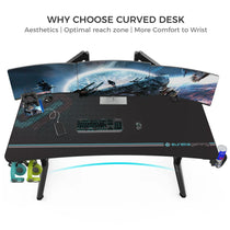 Eureka Ergonomic Curved Gaming Desk With Accessories, Black Desk, Multiple Monitors, and Headset.