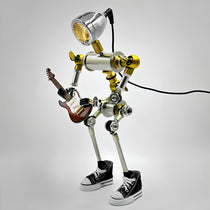 Robot-Shaped Table Lamp Decor With Guitar, Cyberpunk Design, and Industrial Elements.