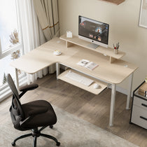 Ergonomic L-Shaped Desk With Pull-Out Keyboard Tray, Logitech Keyboard, Light Wood Finish.